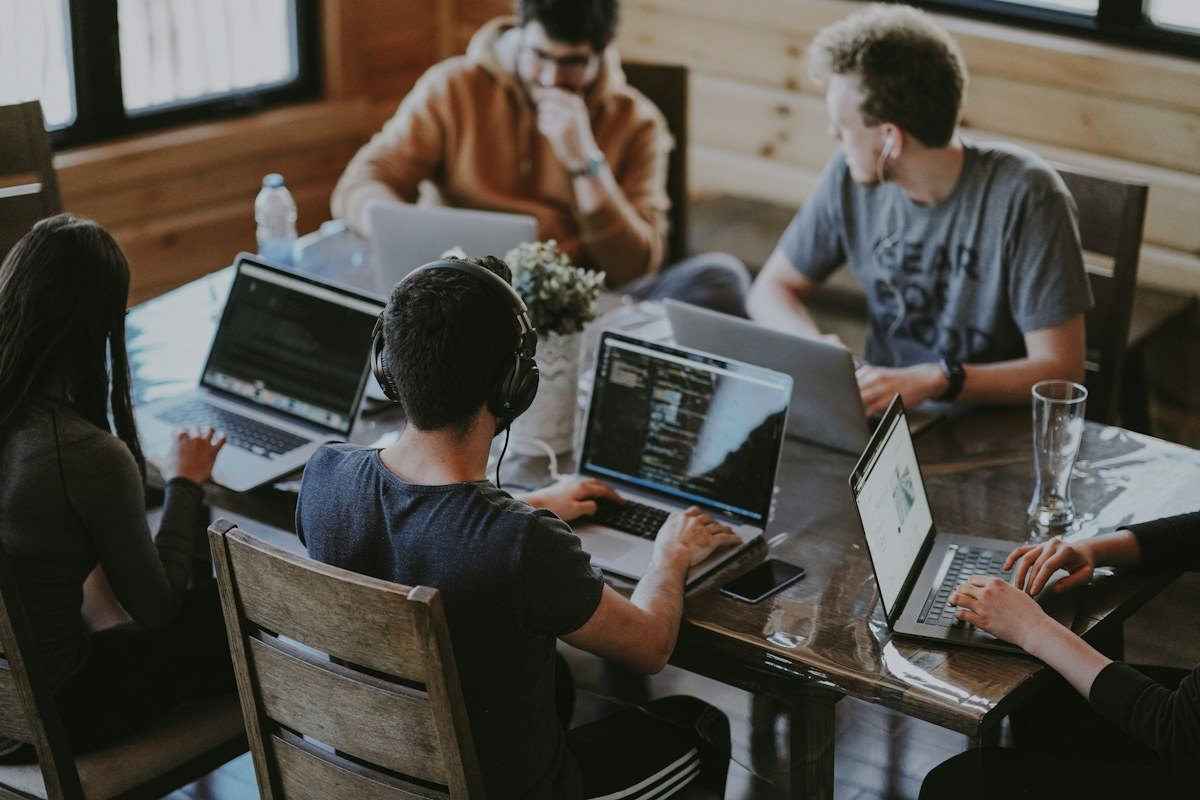 Creative team collaborating around a table